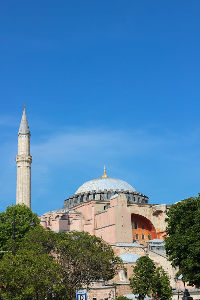 Capture of Hagia Sophia's majestic architecture in Istanbul under a clear blue sky.